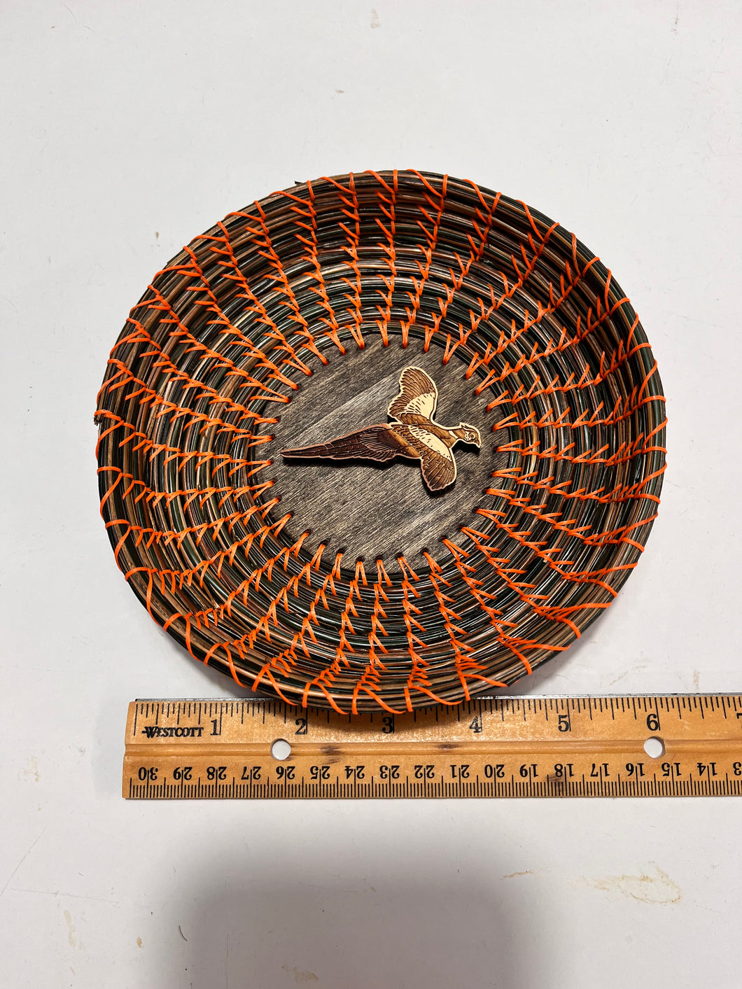 Pheasant wood decor on Pine Needle Basket